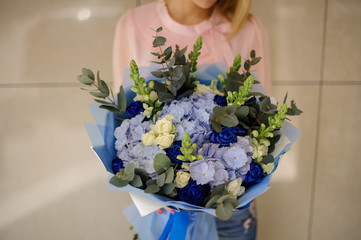 Fashionable bouquet of fresh flowers in blue tones