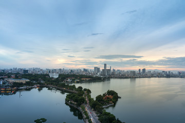 Fototapeta premium Aerial view of Hanoi skyline at West Lake or Ho Tay. Hanoi cityscape at twilight