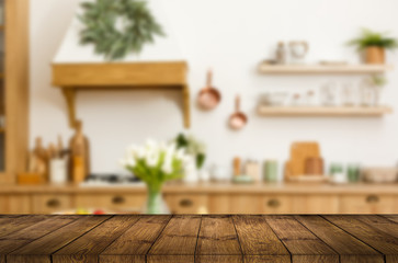 Wood table top on blur kitchen room background .For montage product display or design key visual layout.