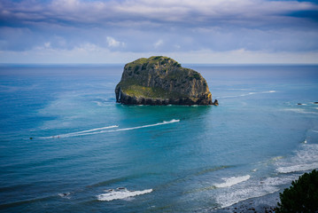 Fototapeta na wymiar Huge cliffs near the island of Gastelugache. Basque country. Northern spain