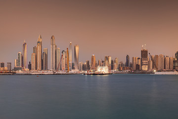 Fototapeta na wymiar Dubai Marina skyline view from Palm Jumeirah, sunset