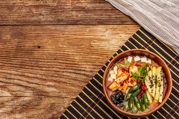 Traditional Korean spicy soup with kimchi, tofu, vegetables. Hot dish for healthy meal