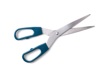 Scissors with green handle isolated on white