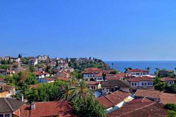  urban landscape on old city of turkish antalya with hot summer day with blue sky