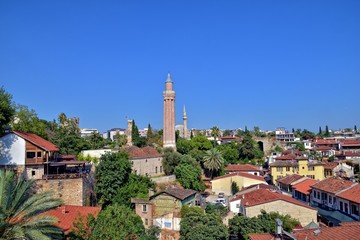  urban landscape on old city of turkish antalya with hot summer day with blue sky