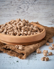 Oat bran on old wooden table