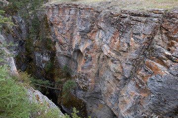 The Maligne river as it flows through the deep gorges of the Maligne Canyon in Jasper National Park...