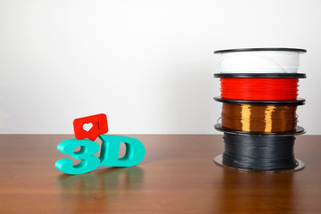 3D printing filament reels with text 