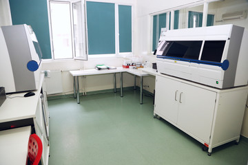 Medical laboratory showing several automated analysers