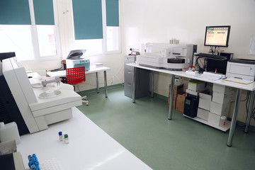 Medical laboratory showing several automated analysers