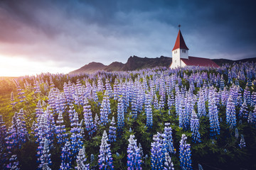 Great view of Vikurkirkja christian church. Location place Vik i Myrdal village, Iceland, Europe.