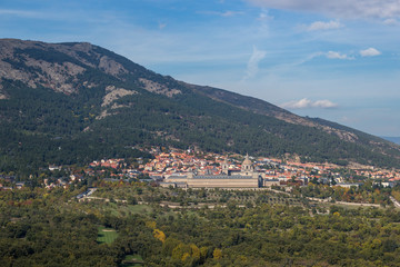 Fototapeta na wymiar Views of the town of San Lorenzo del Escorial and its famous monastery, located in the city of Madrid and surrounded by the natural environment of the Sierra de Guadarrama