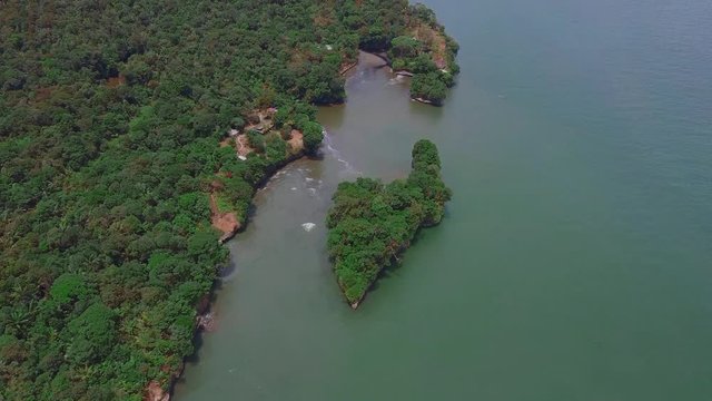 Amazing Reveal Of The Pacific Jungle. Aerial View Of The Pacific Sea And A Small Island Located In Bahia Malaga National Natural Park. Colombia.