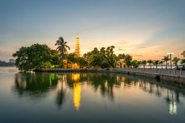 Tran Quoc pagoda, the oldest Buddhist temple in Hanoi, at twilight. The famous destination travel in Hanoi