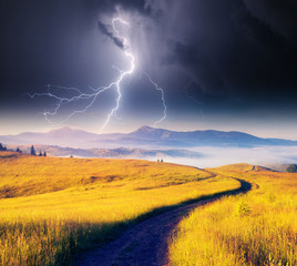 Naklejka na ściany i meble Impressive view of ominous sky. Carpathian national park, Ukraine.
