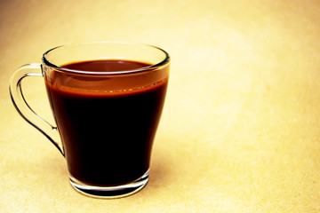 Cup with cocoa on a beige background