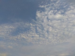 Fototapeta na wymiar Clouds high in the blue sky