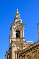 Fototapeta na wymiar Church Bell Tower of the Parish Church of Stella Maris in the town of Sliema,Malta.