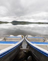Obraz premium Rowing boats moored at idyllic lake