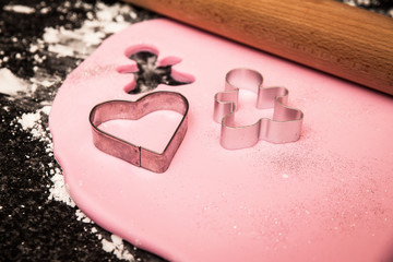pink cookie dough with heart cutout