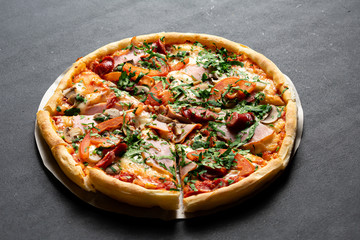 Pizza on dark background. Pizza menu. Space for text.
