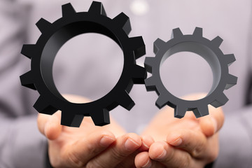 Business, Internet and technology concept. Business select gear icon on virtual screen.