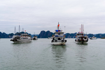3 boats in harbor