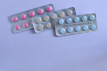 Pills in a row with copy space a top view