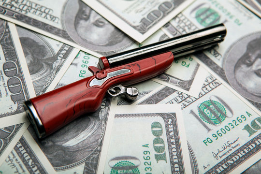 image of money banknote gun  