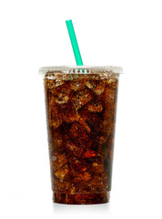 Cola in disposable plastic glass with straw and ice cubes isolated on white background