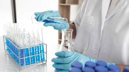 Female scientist are experimenting in the laboratory.
