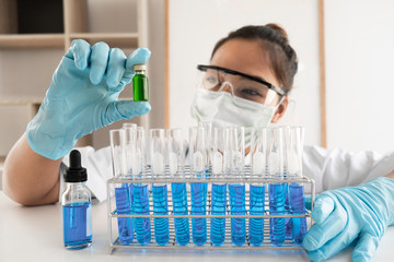 Female scientist are experimenting in the laboratory.