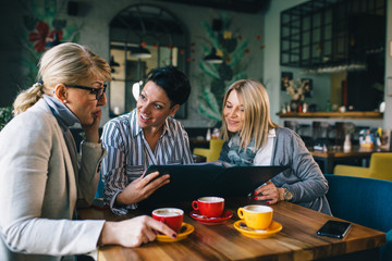 women ordering food at the restaurant