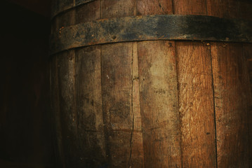 Beer barrel close-up. Oak barrel texture - obrazy, fototapety, plakaty