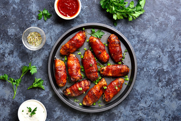 Bacon wrapped grilled chicken wings