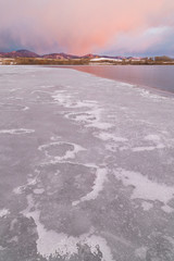 Frozen Colorado Lake at sunrise