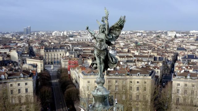 Detail of Angel of liberty Girondins monument Bordeaux, France, Aerial circling shot