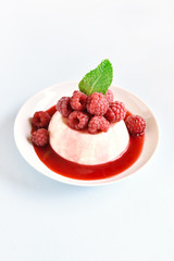 Panna cotta with fresh raspberries