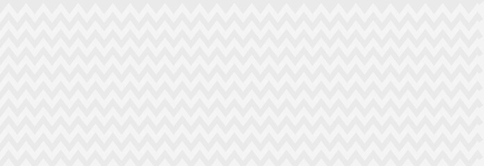 White background with a graphic pattern of lines and stripes, texture of gray zigzags and waves. Modern abstract design in bright colors, a template for a screensaver.