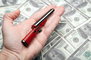 image of hand shotgun money 