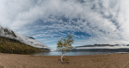 Beautiful autumn mountain lake and mountains