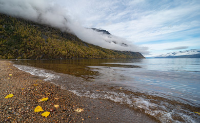 Beautiful autumn mountain lake and mountains