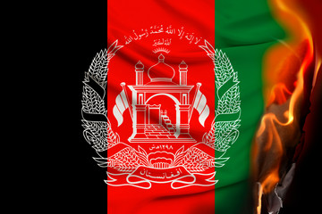 fire on the silk national flag of Afghanistan with beautiful folds, the concept of a ban on tourism, political repression, crime, violation of the rights and freedoms of citizens