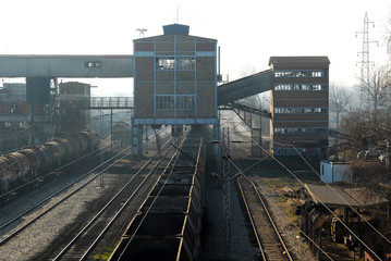 Obraz premium Freight train station. Composition of freight wagons. Rails at the train station. Loading point for the railway station.