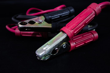 battery cable on black background.