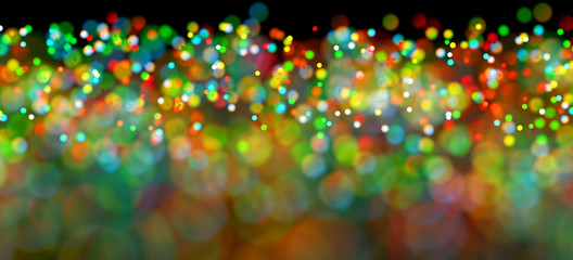 Abstract bokeh lights soft blinking colorful background.