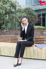 female staff holding a folder