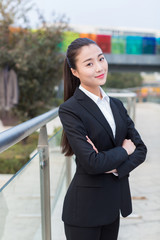 girl standing on the bridge