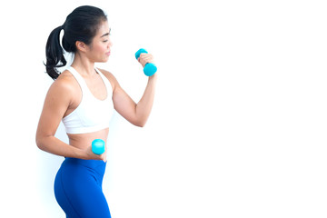 a beautiful asian sporty woman wear blue and white outfit standing and posing  with dumbbells on white background.fitness lady smile with good health