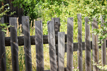 Background of an old crooked fence.